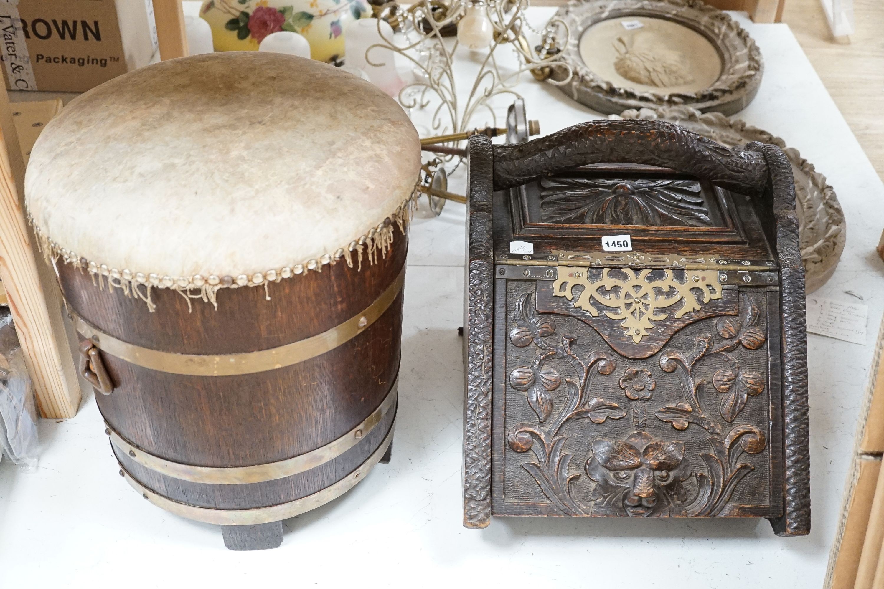 A carved oak purdonium and a circular wooden log box, overall height 42cm